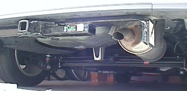 curt hitch from below, showing exhaust pipe modification
